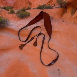 Brown 100% leather wrap around belt.